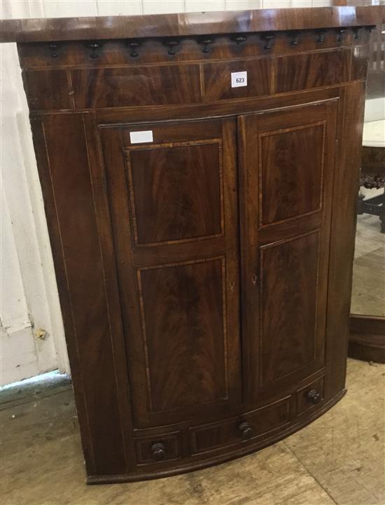 George III inlaid mahogany bowfront corner cupboard